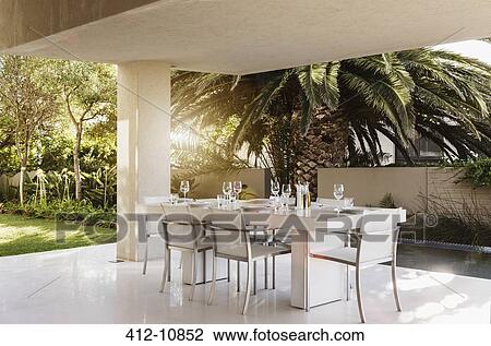Set table on modern patio View Large Photo Image Stock Image - Set table on modern patio. Fotosearch