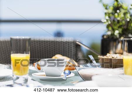 Set table on modern patio View Large Photo Image Stock Photo - Set table on modern patio. Fotosearch
