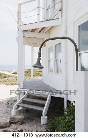 Shower in backyard of beach house View Large Photo Image Stock Photo - Shower in backyard of beach house. Fotosearch