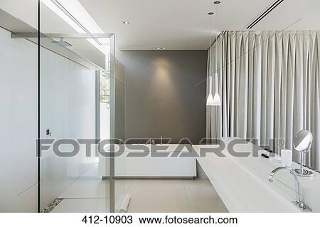 Sink, bathtub and shower in modern bathroom View Large Photo Image Stock Image - Sink, bathtub and shower in modern bathroom. Fotosearch