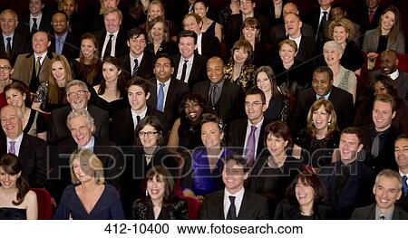 Smiling theater audience View Large Photo Image Stock Image - Smiling theater audience. Fotosearch