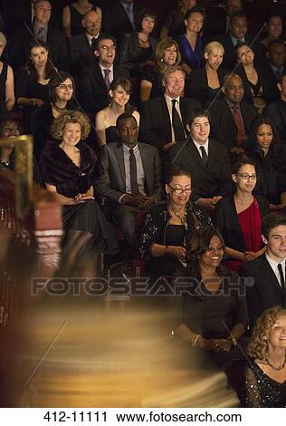 Smiling theater audience View Large Photo Image Stock Image - Smiling theater audience. Fotosearch