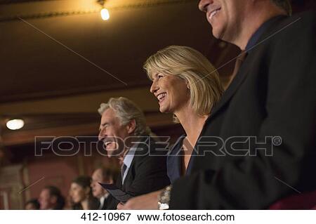 Smiling theater audience View Large Photo Image Stock Photo - Smiling theater audience. Fotosearch