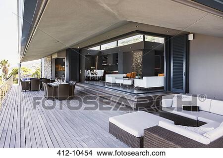 Sofa, tables and chairs on modern balcony View Large Photo Image Picture - Sofa, tables and chairs on modern balcony. Fotosearch