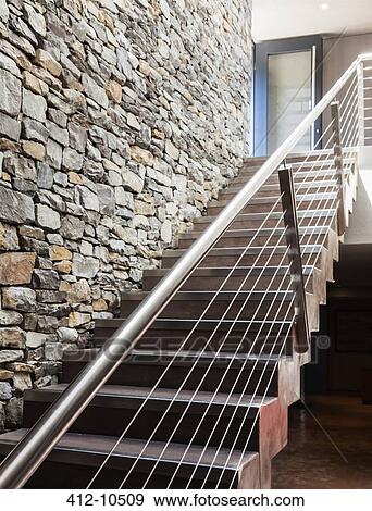 Stone wall and modern staircase View Large Photo Image Stock Photo - Stone wall and modern staircase. Fotosearch