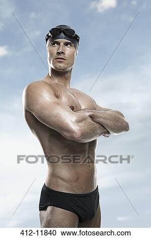 Swimmer wearing cap and goggles View Large Photo Image Stock Image - Swimmer wearing cap and goggles. Fotosearch