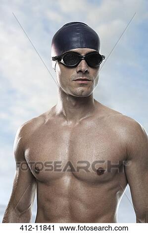 Stock Image - Swimmer wearing cap and goggles. Fotosearch