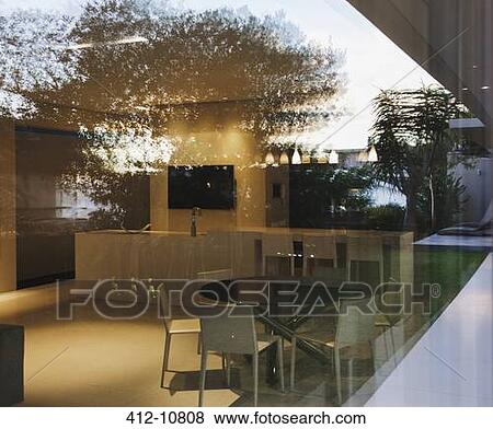Stock Photo - Table and chairs in modern kitchen. Fotosearch