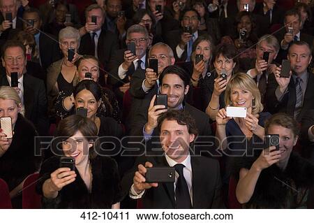 Theater audience videoing performance with smart phones View Large Photo Image Stock Image - Theater audience videoing performance with smart phones. Fotosearch