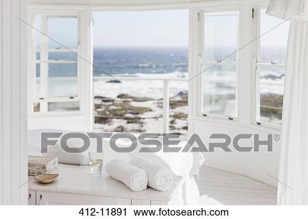 White bedroom overlooking ocean View Large Photo Image Stock Image - White bedroom overlooking ocean. Fotosearch