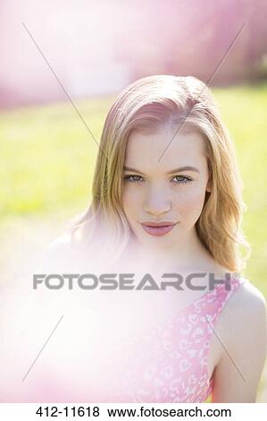 Woman smiling outdoors View Large Photo Image Stock Photo - Woman smiling outdoors. Fotosearch