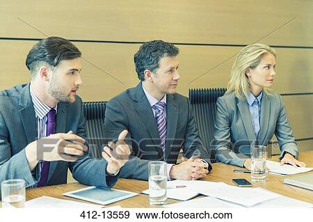Business people in meeting View Large Photo Image Stock Photo - Business people in meeting. Fotosearch
