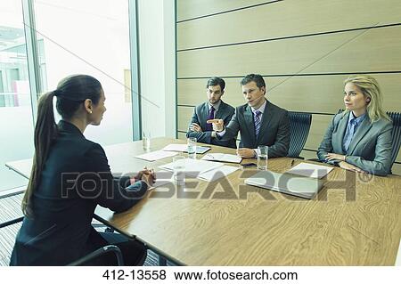 Business people talking in meeting View Large Photo Image Stock Photo - Business people talking in meeting. Fotosearch