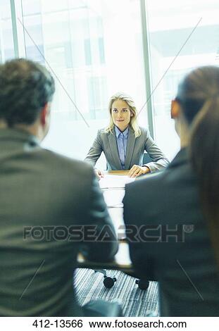 Stock Photograph - Business people talking in meeting. Fotosearch