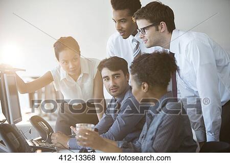 Business people talking in office View Large Photo Image Stock Photo - Business people talking in office. Fotosearch