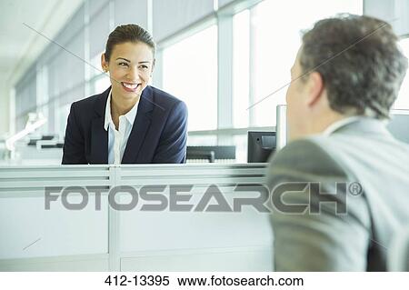 Business people talking in office View Large Photo Image Stock Photography - Business people talking in office. Fotosearch