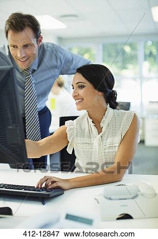 Business people working in office View Large Photo Image Stock Photo - Business people working in office. Fotosearch