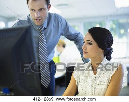 Business people working in office View Large Photo Image Stock Photo - Business people working in office. Fotosearch