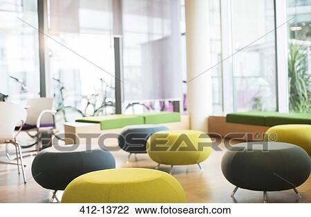 Chairs and tables in empty lounge View Large Photo Image Stock Image - Chairs and tables in empty lounge. Fotosearch