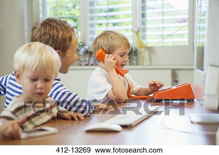 Children working in home office View Large Photo Image Stock Photo - Children working in home office. Fotosearch