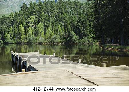 Picture - Dock leading to lake. Fotosearch