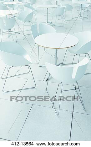 Empty chairs and tables View Large Photo Image Picture - Empty chairs and tables. Fotosearch