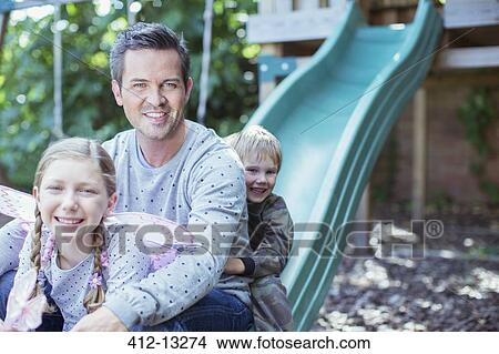 Father and children playing on play structure View Large Photo Image Picture - Father and children playing on play structure. Fotosearch