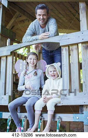 Father and children playing on playset View Large Photo Image Stock Photograph - Father and children playing on playset. Fotosearch