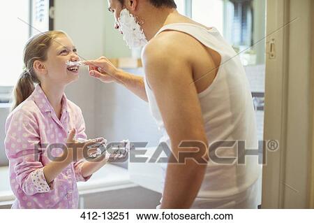 Father and daughter playing with shaving cream View Large Photo Image Stock Image - Father and daughter playing with shaving cream. Fotosearch