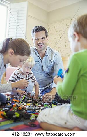 Father playing with children View Large Photo Image Stock Photo - Father playing with children. Fotosearch