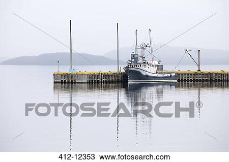 Fishing boat mooring at dock View Large Photo Image Stock Image - Fishing boat mooring at dock. Fotosearch