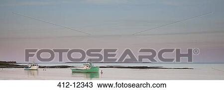 Fishing boats in calm bay View Large Photo Image Stock Image - Fishing boats in calm bay. Fotosearch