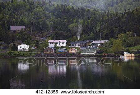 Stock Photography - Houses along calm bay. Fotosearch