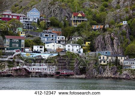 Houses on craggy waterfront View Large Photo Image Stock Photo - Houses on craggy waterfront. Fotosearch