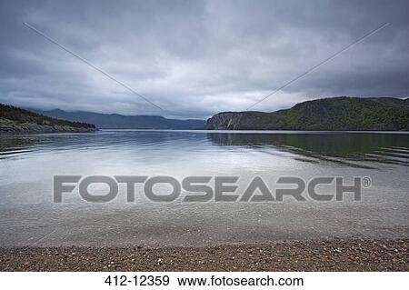 Stock Photo - Scenic view of calm bay. Fotosearch