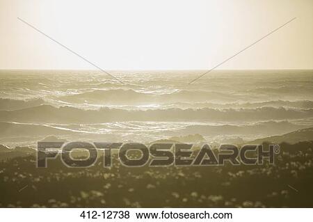 Stock Photo - Scenic view of ocean waves. Fotosearch