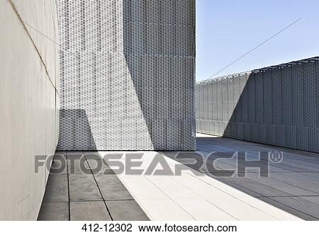 Sunlight and shadows on wall of modern building View Large Photo Image Stock Image - Sunlight and shadows on wall of modern building. Fotosearch