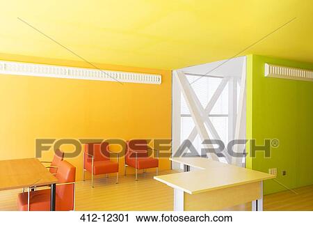 Stock Image - Tables and chairs in bright office. Fotosearch