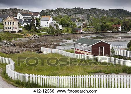 Village along bay at low tide View Large Photo Image Stock Photo - Village along bay at low tide. Fotosearch