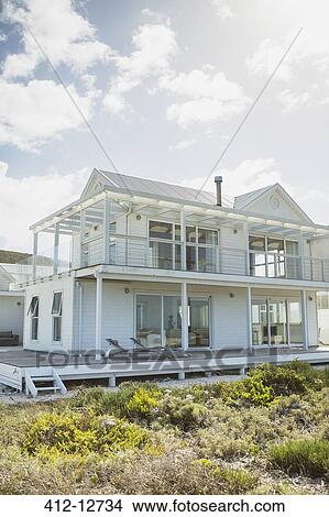 Picture - White beach house. Fotosearch