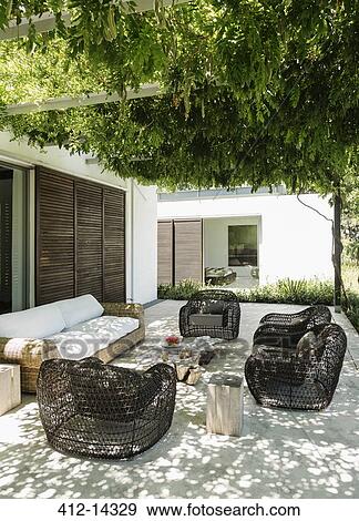 Armchairs and sofa on luxury patio View Large Photo Image Stock Photo - Armchairs and sofa on luxury patio. Fotosearch