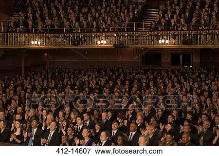 Audience applauding in theater View Large Photo Image Stock Photo - Audience applauding in theater. Fotosearch