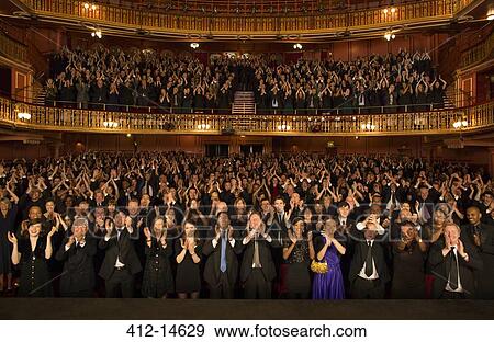Audience applauding in theater View Large Photo Image Stock Photo - Audience applauding in theater. Fotosearch