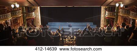 Audience applauding in theater View Large Photo Image Stock Photo - Audience applauding in theater. Fotosearch