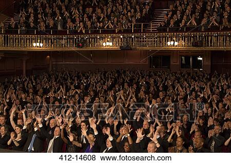 Audience cheering in theater View Large Photo Image Stock Photo - Audience cheering in theater. Fotosearch