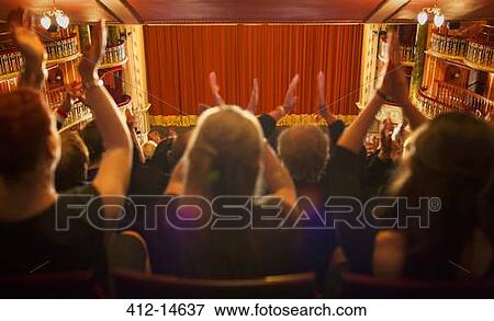 Audience clapping in theater View Large Photo Image Stock Photo - Audience clapping in theater. Fotosearch