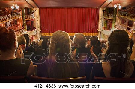 Audience clapping in theater View Large Photo Image Stock Photograph - Audience clapping in theater. Fotosearch