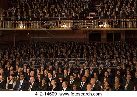 Audience sitting in theater View Large Photo Image Stock Photo - Audience sitting in theater. Fotosearch