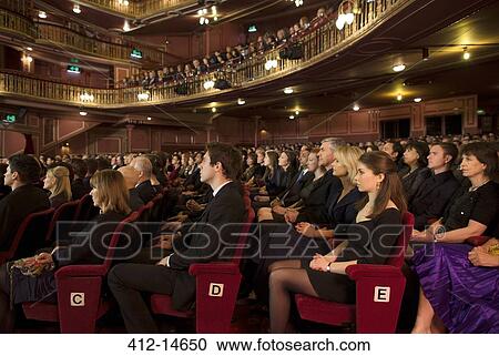 Audience watching performance in theater View Large Photo Image Stock Image - Audience watching performance in theater. Fotosearch