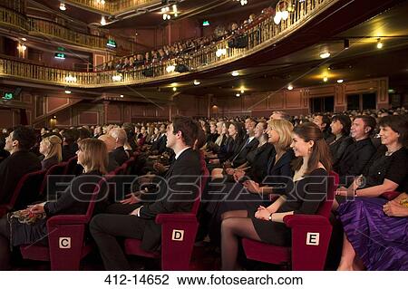 Audience watching performance in theater View Large Photo Image Stock Image - Audience watching performance in theater. Fotosearch
